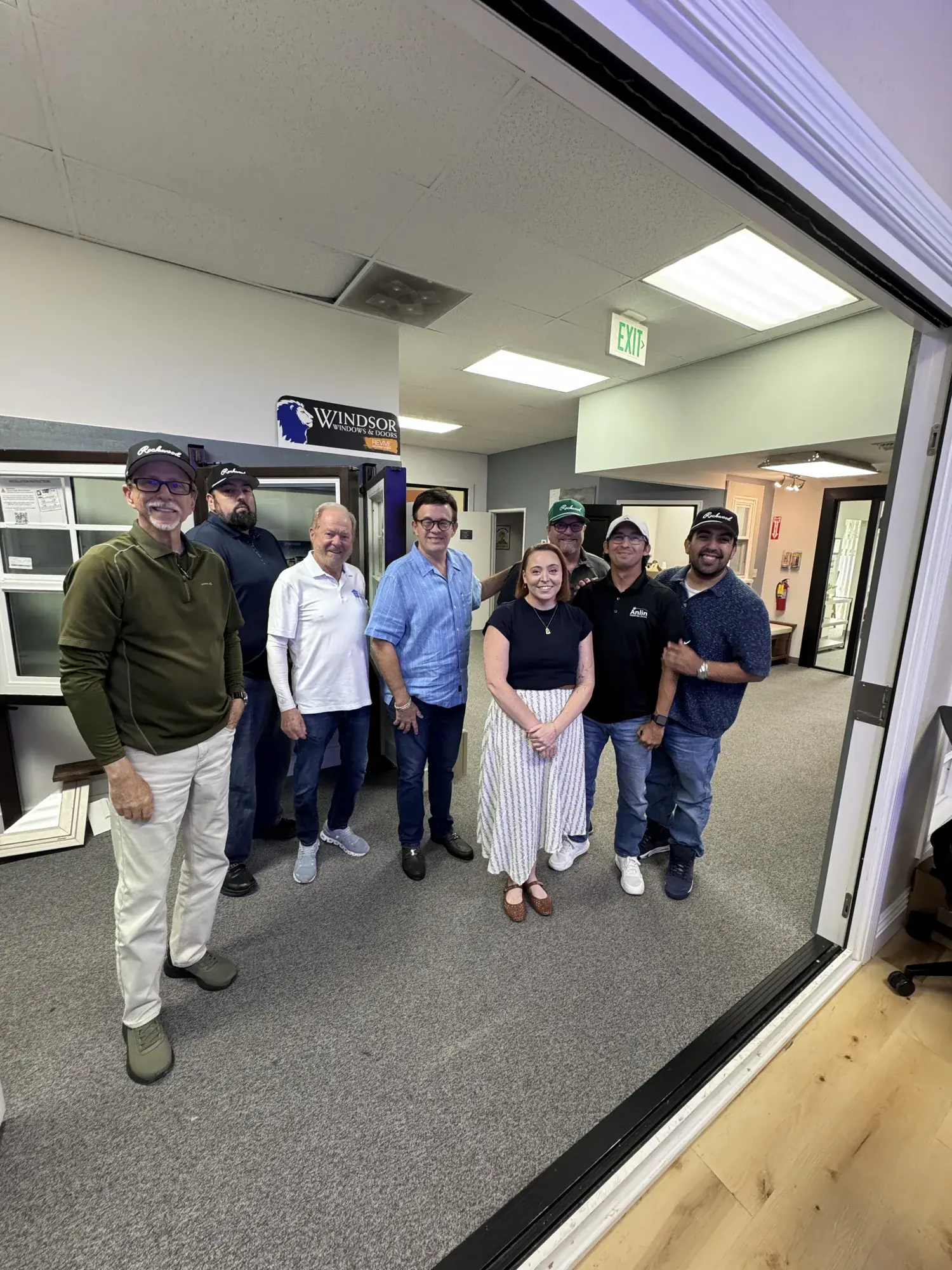 Partner and installer group photo in a showroom