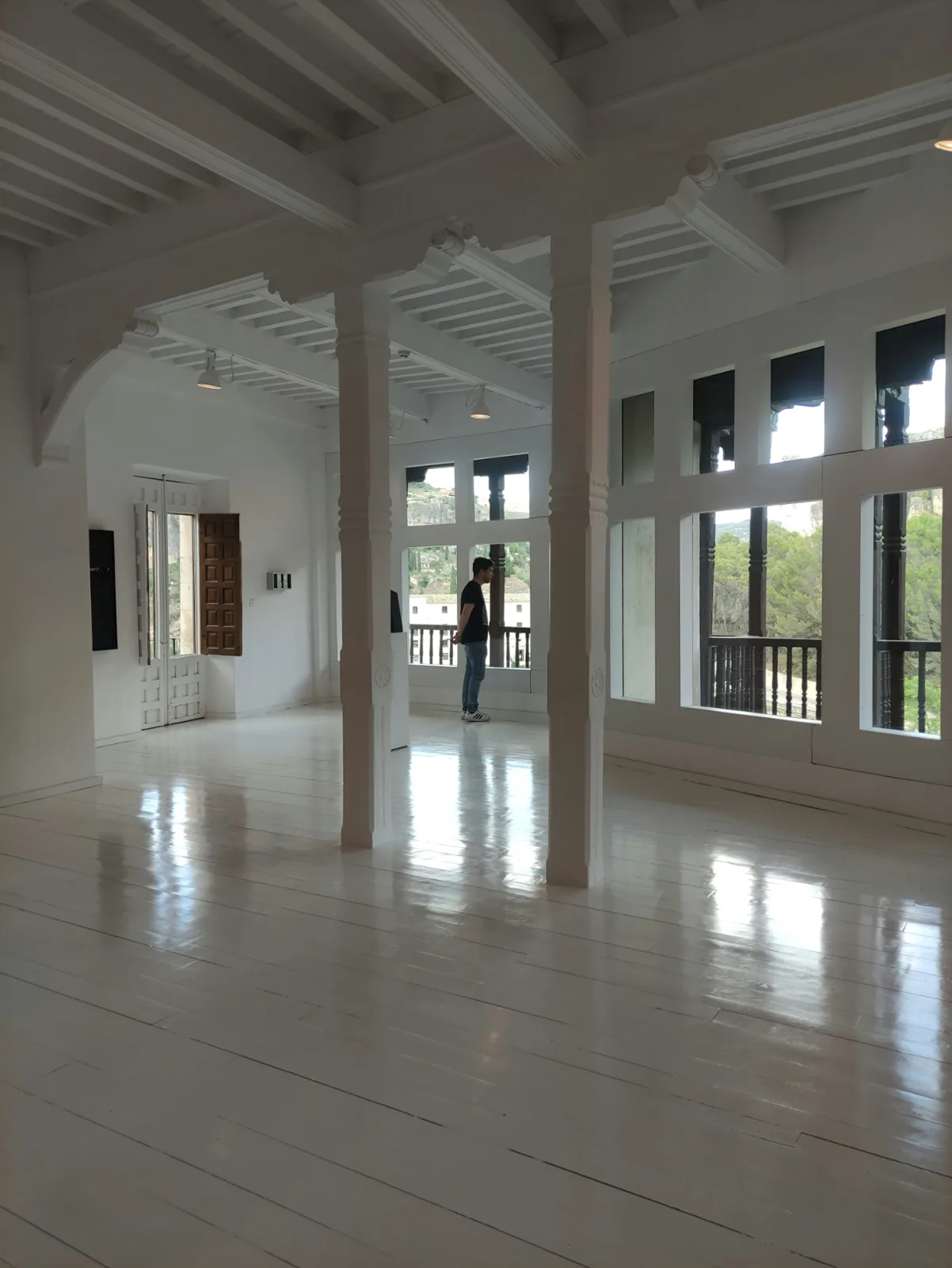 Bright room with bare windows and no window treatments
